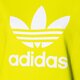 Női pulóver ADIDAS PULÓVER KAPUCNIS TRF HOODIE he6950 szín: sárga
