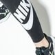 Női nadrágok NIKE LEGGINGS W NSW LEGASEE LGNG HW FUTURA cj2297-011 szín: fekete