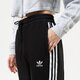 Női nadrágok ADIDAS 3 STRIPES OVERSIZED JOGGERS hm2143 szín: fekete