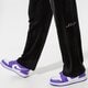 Női nadrágok ELLESSE NADRÁG DIZA TRACK PANT WSHD BLK sgm14166079 szín: fekete