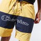 Férfi rövidnadrágok CHAMPION RÖVIDNADRÁG LOGO SWIM SHORTS 215499ys001 szín: sárga