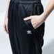 Női nadrágok ADIDAS NADRÁG TRACKPANT fl4125 szín: fekete