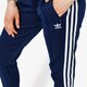 Női nadrágok ADIDAS NADRÁG SST TP ADICOLOR dv2639 szín: sötétkék