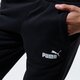 Férfi nadrágok PUMA NADRÁG ESS LOGO TR CL 58671601 szín: fekete