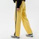 Női nadrágok ELLESSE NADRÁG ATER TRACK PANT YELLOW sgk12166606 szín: sárga