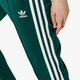 Női nadrágok ADIDAS NADRÁG SST TP ADICOLOR dv2637 szín: zöld