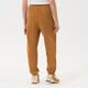 Női nadrágok PUMA NADRÁG PUMA INFUSE SWEATPANTS 535644-74 szín: mustársárga