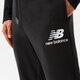 Férfi nadrágok NEW BALANCE NADRÁG NB ESSENTIALS STACKED LOGO SWEATPANT mp03558bk szín: fekete