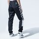 Női nadrágok PUMA NADRÁG TFS OG AOP PANTS 59706001 szín: fekete