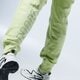 Női nadrágok NIKE NADRÁG W NSW AIR PANT FLC BB cj3047-367 szín: zöld