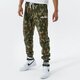 Férfi nadrágok ELLESSE NADRÁG NIORO CAMO JOG PANT KHA shk12436506 szín: narancssárga