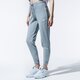 Női nadrágok NIKE NADRÁG SPORTSWEAR ESSENTIAL bv4099-063 szín: szürke