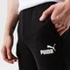 Férfi nadrágok PUMA NADRÁG ESS LOGO PANTS FL CL - PUMA BLACK 58671401 szín: fekete