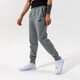 Férfi nadrágok PUMA NADRÁG ESS LOGO PANTS FL CL - MEDIUM GRAY HEATHER 58671403 szín: szürke